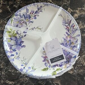 The Farmhouse 4 melamine plates.  NWT 
Beautiful purple flowers white background